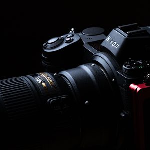 Detailed close-up of a modern DSLR camera showcasing its sleek design and advanced features.