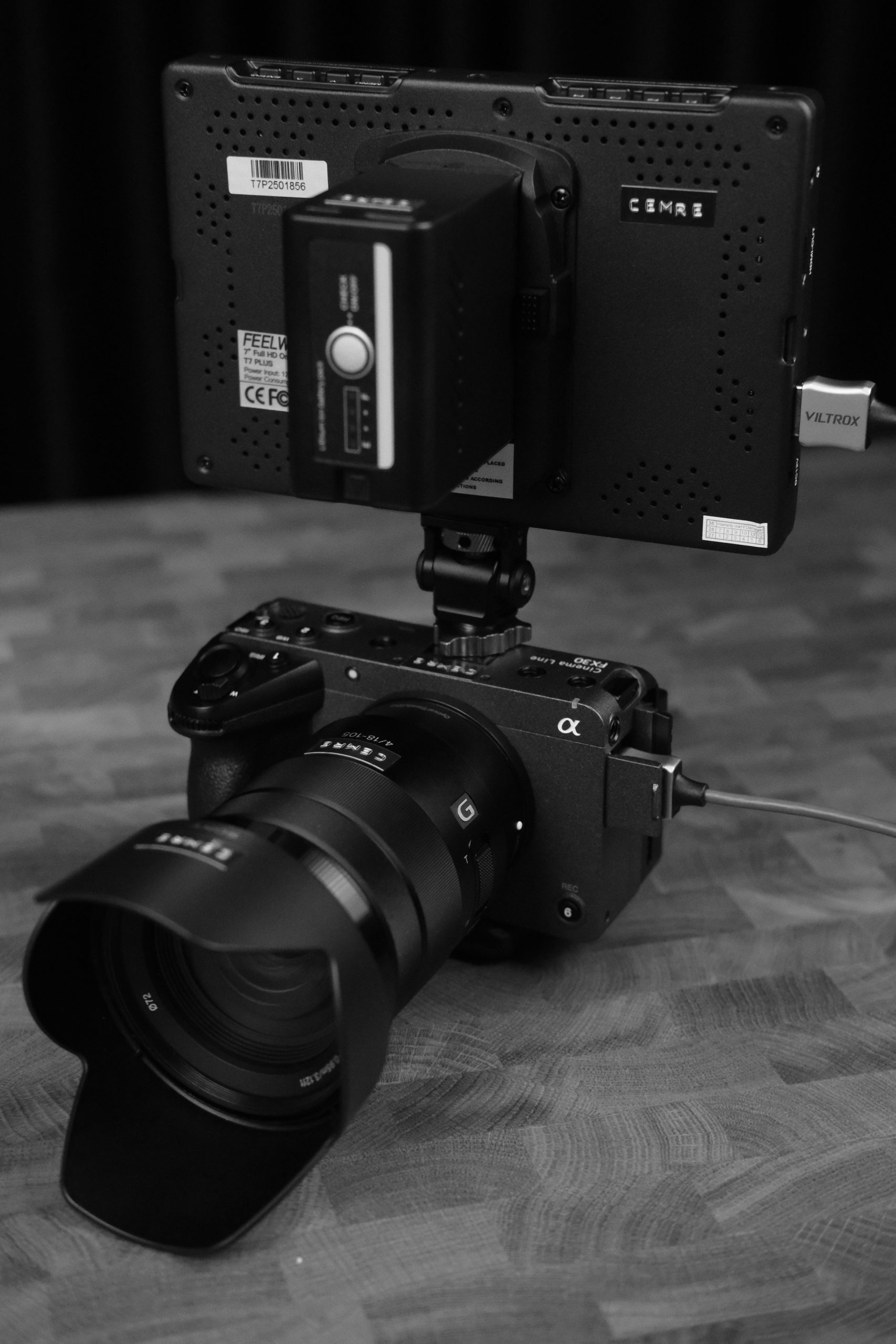 pexels photo 36786129 36786129 Professional camera rig featuring a lens and external monitor in a sophisticated setup.