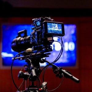 High-tech video camera setup in modern studio environment, showcasing professional equipment for filming.